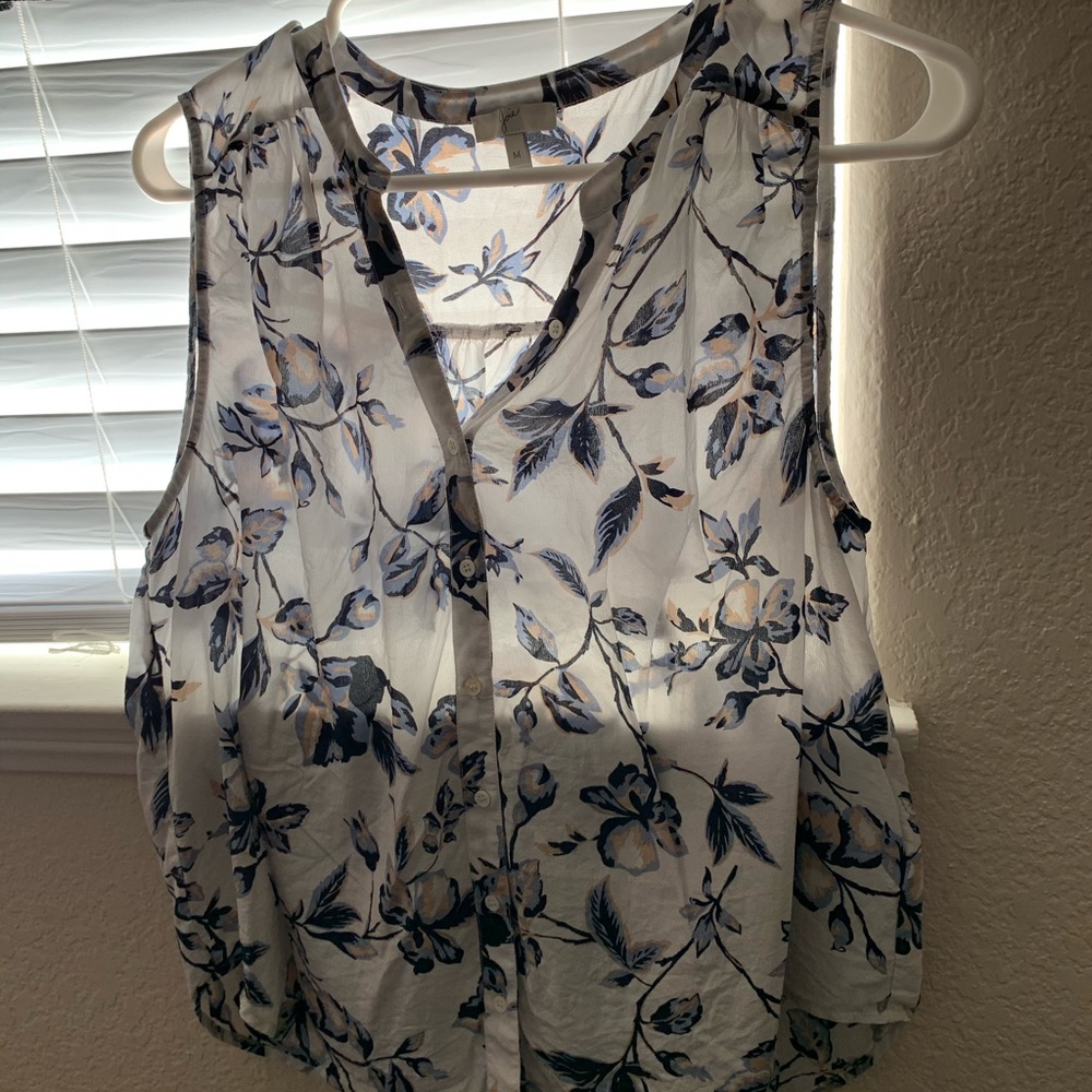 White blouse with non traditional pink and blue